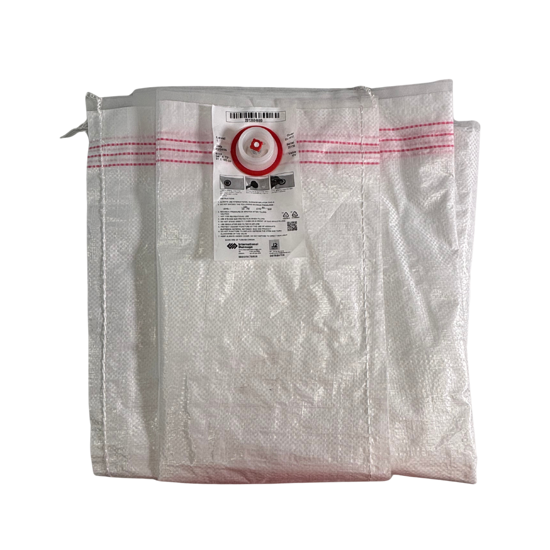 12680 Un airbag de rafia desinflado, mostrando su material de rafia de polipropileno y su válvula de seguridad.